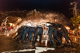 Participants are doused with purifying water in the last main event of the festival.
